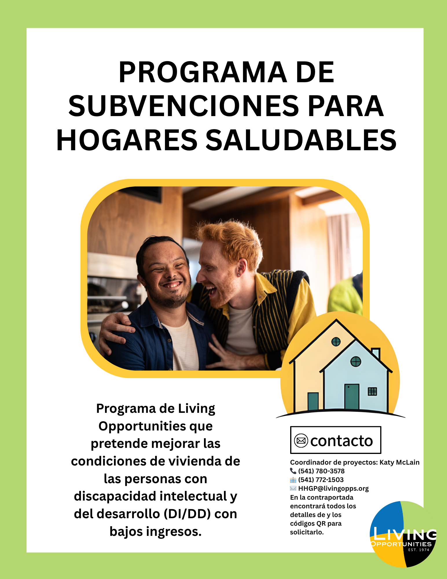 Two men are sitting together smiling.